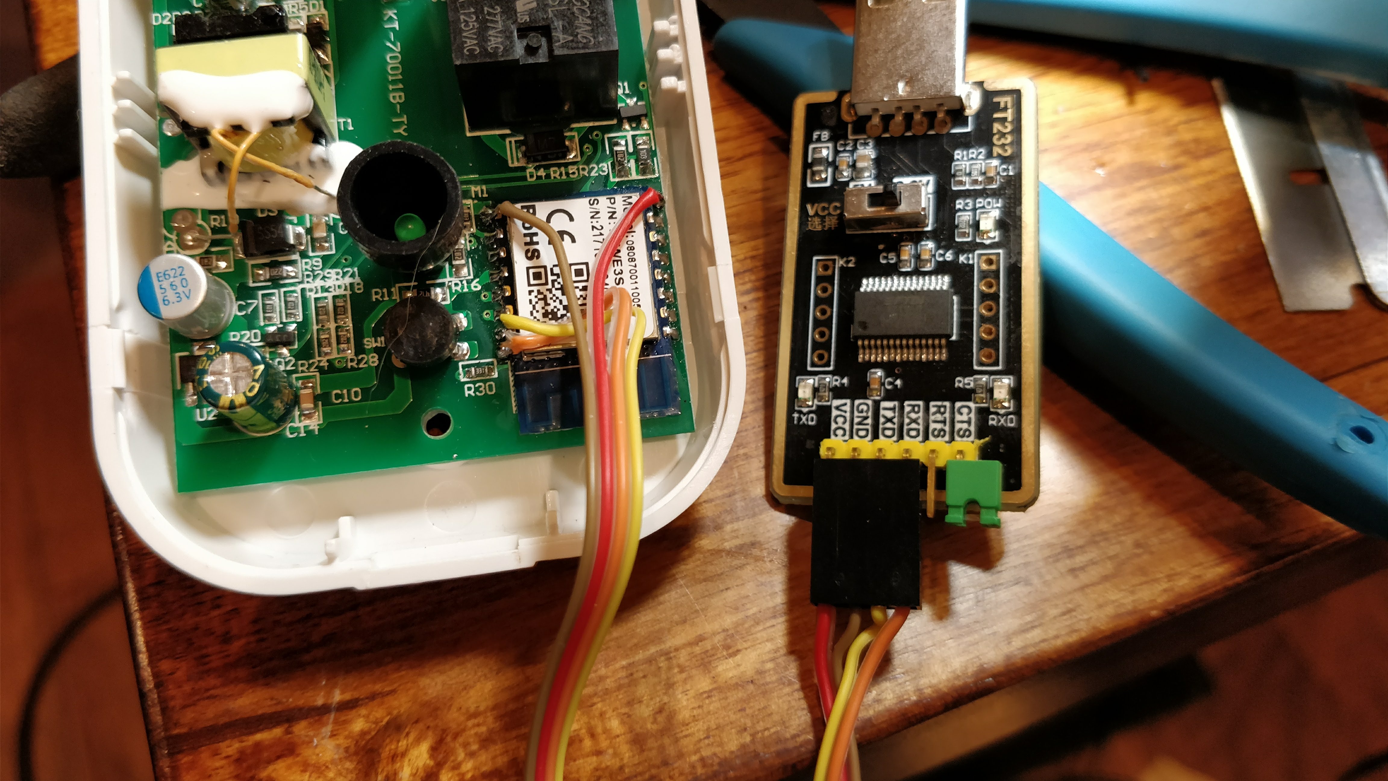 Photo of the Smart Plug connected to a serial flasher